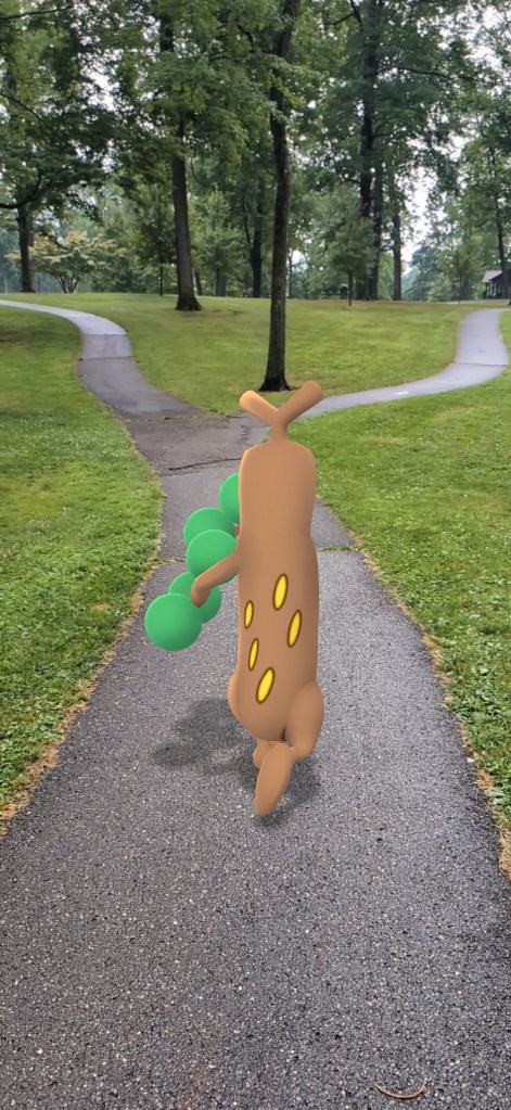 A Pokemon is walking away from the camera with a jaunty walk.